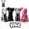 Black mini KAWS figure